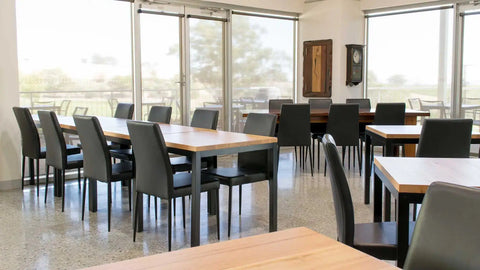 Black Adelaide Function Chairs With Black Legs And Custom Timber Table Tops At Lambert Estate