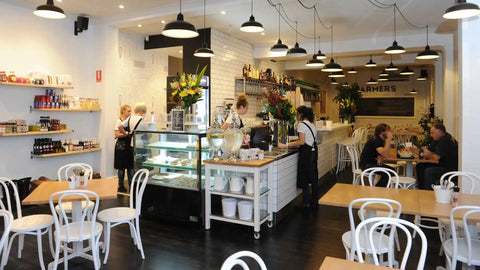 Bentwood White Side Chairs And Custom Tasmanian Oak Table Tops With Cross Table Base At Jarmers Kitchen