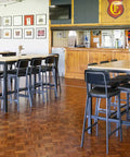 Caprice Black Bar Stools And Henley Table Frames With Melamine Table Tops In Main Bar Dining At Flinders Park Football Club