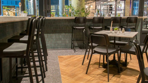 Caprice Bar Stools And Side Chairs With Compact Laminate Table Tops At Cafe Primo TTP
