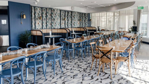 Bentwood ArmChairs And Monique Chairs With Carlton Round Table Base And Rubberwood Table Tops At Hotel Pacific Dining Area