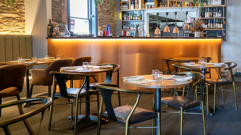 Coleman Armchair And Mulberry Armchair With Metal Leg Miller Table Base With Natural Elm Table Top At Agapi Greek Cuisine