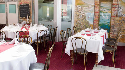 Coleman Bistro Chairs In Main DIning At Enzos