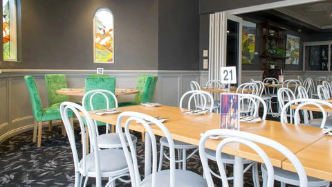 Custom Powdercoated Coleman Bistro Chairs With Natural Rubberwood Table Tops And Davido Table Bases In The Main Dining Room At Kingsford Hotel