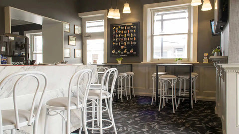 Custom Powdercoated Coleman Bistro Stools With And Coleman Without Back Stools With Custom Dry Bar In The Bar Area At The Kingsford Hotel