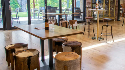 Sia Low Stools With Carlton Rectangle Table Base And Tasmanian Oak Table Tops Coleman Spinner Stools At Wolf Blass Dining