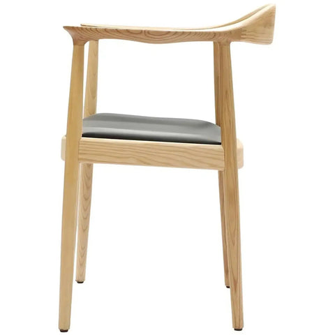 Hansel Armchair In Natural With Black Vinyl Seat Pad, Viewed From Side