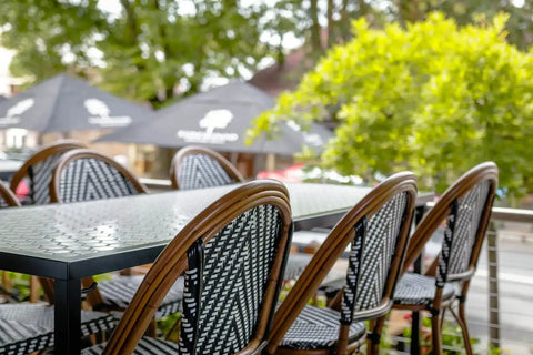 Jasmine Stools And Custom Tiled Tables ON Outside Balcony At The Haus Restaurant