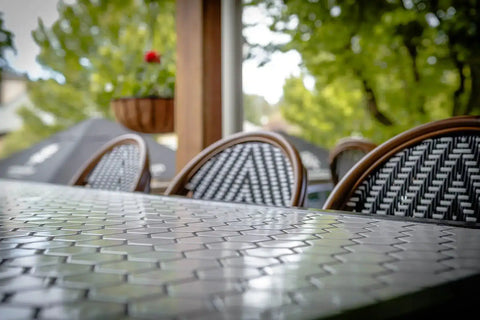 Custom Tiles Tables With Jasmine Stools At The Haus Restaurant