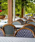Jasmine Stools And Custom Tiled Tables In Outdoor Dining Area At The Haus Restaurant