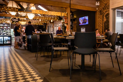 Fly Side Chairs In Front Bar Dining At The Haus Restaurant