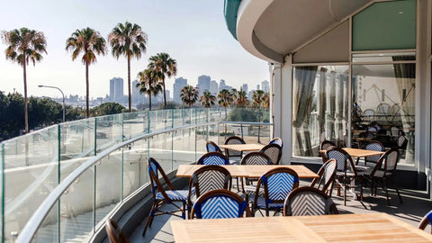 Cross By S.C.A.B Table BAse With Teak Table Top And Jasmine Chairs In Outdoor Dining At Hotel Pacific