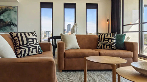 Living Dining Room Featuring Custom Sofas, Artwork And Cushions At The Kt Apartments