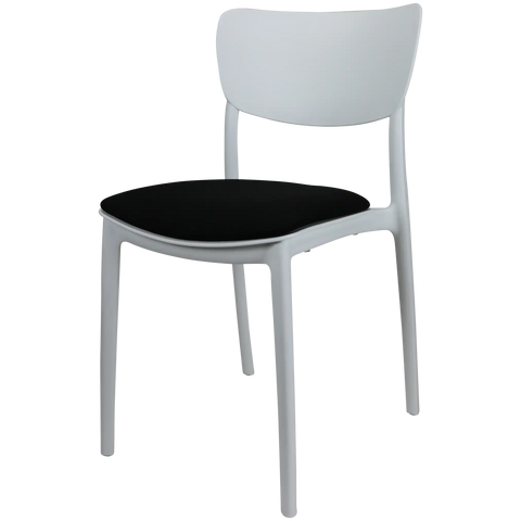 Monna Chair By Siesta In White With Black Seat Pad, Viewed From Angle