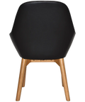 Monte Tub Chair With Light Oak Timber 4 Leg And Black Vinyl Shell, Viewed From Back