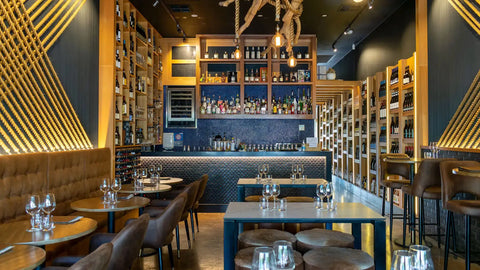 Mulberry Armchairs And Stools With Elm Natural Tabel Tops And Citadel Table Base At Amor Wine Tapas Cocktails