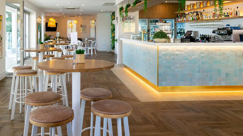 Nika Bar Stool With Custom Upholstered Seat Pad At The Lighthouse Wharf Hotel