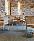Sienna Chairs Natural With Carlton Table Base And Elm Table Tops In Dining Area At Rezz Hotel 