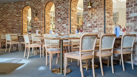 Sienna Chairs In Natural With Carlton Table BAses And Natural Elm Table Tops At Rezz Hotel