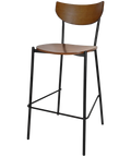 Ronaldo Bar Stool With A Black Metal Frame And Light Walnut Seat And Backrest, Viewed From Angle In Front