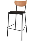 Ronaldo Bar Stool With A Black Metal Frame Black Vinyl Seat And A Natural Backrest, Viewed From Angle In Front