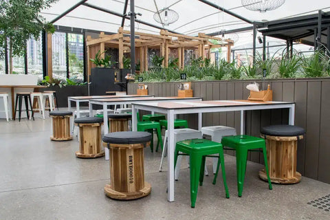 Custom Compact Laminate Table Tops On White Henley Table Bases With Titus Stools At The Gully Public House & Garden