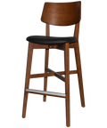 Vinnix Bar Stool With Light Walnut Timber Frame And Black Vinyl Upholstered Seat, Viewed From Angle In Front