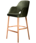 Alfi Bar Stool With Arms With Avocado Velvet Shell And Trojan Oak Timber Legs, Viewed From Angle In Front