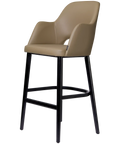 Alfi Bar Stool With Arms With Taupe Vinyl Shell And Black Timber Legs, Viewed From Angle In Front