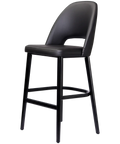 Alfi Bar Stool With Black Vinyl Shell And Black Timber Legs Black Timber Legs, Viewed From Angle In Front