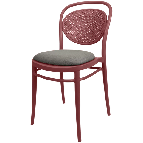 Marcel Chair By Siesta In Marsala With Taupe Seat Pad, Viewed From Angle