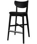 Romano Bar Stool With Black Vinyl Upholstered Backrest And Seat With Black Timber Frame, Viewed From Angle In Front