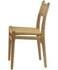 Allegra Restaurant Chair With White Oak Frame and Natural Weave Seat And Back Viewed From Side Angle