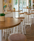 Bar Furniture With White Stools At The Lighthouse Wharf Hotel