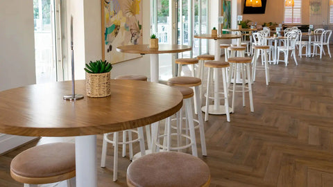 Bar Furniture With White Stools At The Lighthouse Wharf Hotel