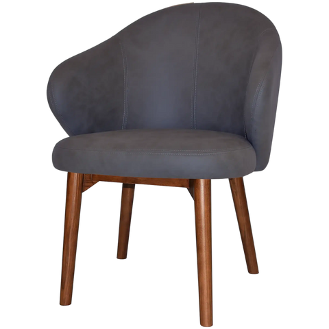 Boss Armchair In Pelle Navy With A Timber Light Walnut Leg, Viewed From Angle In Front