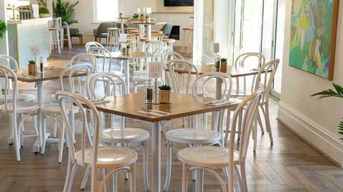 Chair And Table Settings At The Lighthouse Wharf Hotel