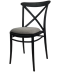 Cross Chair By Siesta In Black With Taupe Seat Pad, Viewed From Angle