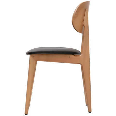 Dan Dining Chair In Natural Timber With Black Vinyl Seat, Viewed From Side