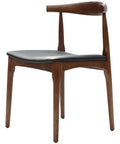 Hansel Elbow Chair In Walnut With Black Vinyl Seat Pad, Viewed From Angle