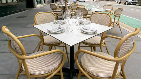 Josephine Armchairs Around Compact Laminate Tops And Miller Table Bases Outside Georges On Waymouth