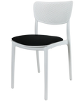 Lucy Chair By Siesta In White With Black Seat Pad, Viewed From Angle