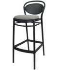 Marcel Bar Stool By Siesta In Black With Taupe Seat Pad, Viewed From Angle