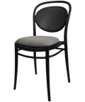 Marcel Chair By Siesta In Black With Taupe Seat Pad, Viewed From Angle