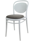Marcel Chair By Siesta In White With Taupe Seat Pad, Viewed From Angle