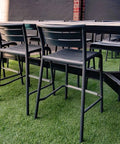 Marco Bar Stools In Outside Dining Area  At Highlander Hotel