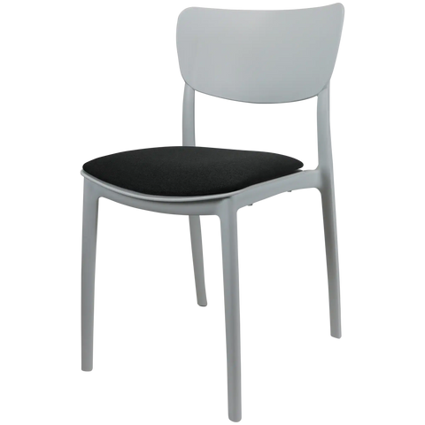 Monna Chair By Siesta In White With Anthracite Seat Pad, Viewed From Angle