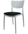 Monna Chair By Siesta In White With Black Vinyl Seat Pad, Viewed From Angle