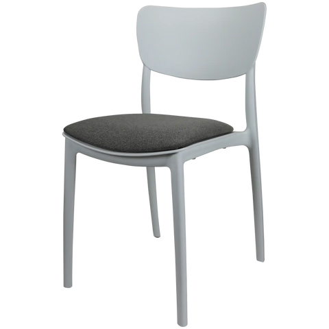 Monna Chair By Siesta In White With Taupe Seat Pad, Viewed From Angle