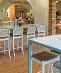 Sienna White Bar Stools And Custom Tiled Bar Tables At Rezz Hotel 